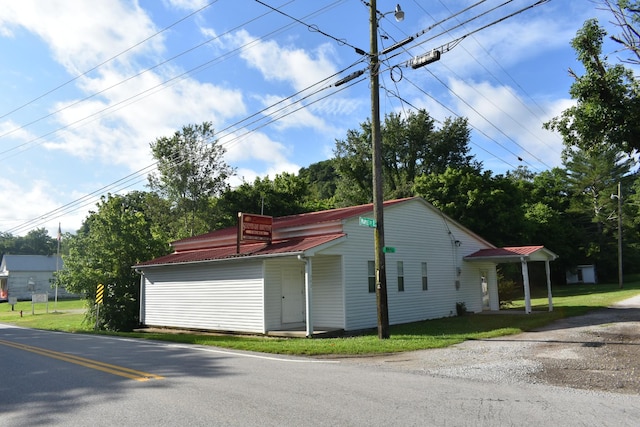 742 Lancaster Hwy, Lancaster, TN 38569 - view of property exterior with a metal roof