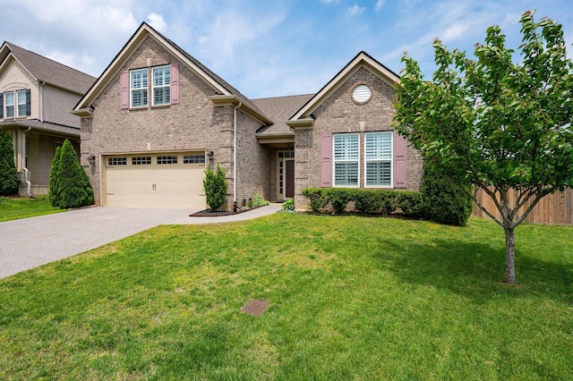 5407 Pisano St, Mount Juliet, TN 37122 - view of front of home with brick siding, a garage, and driveway