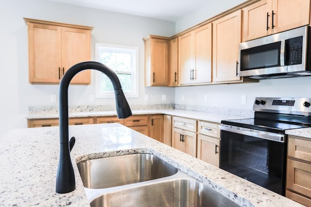 505 Depot St, Chapel Hill, TN 37034 - kitchen featuring stainless steel appliances, light brown cabinetry, and light stone counters