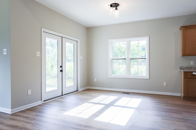 505 Depot St, Chapel Hill, TN 37034 - unfurnished dining area featuring plenty of natural light, french doors, and wood finished floors