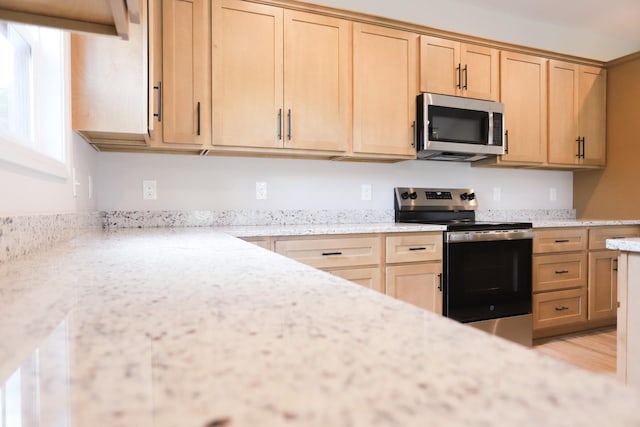 505 Depot St, Chapel Hill, TN 37034 - kitchen featuring stainless steel appliances, light brown cabinetry, and light stone counters