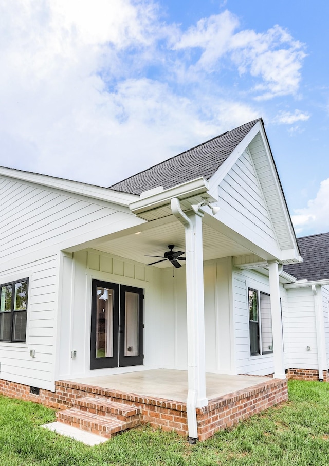 505 Depot St, Chapel Hill, TN 37034 - property entrance with ceiling fan, a shingled roof, crawl space, a patio, and board and batten siding