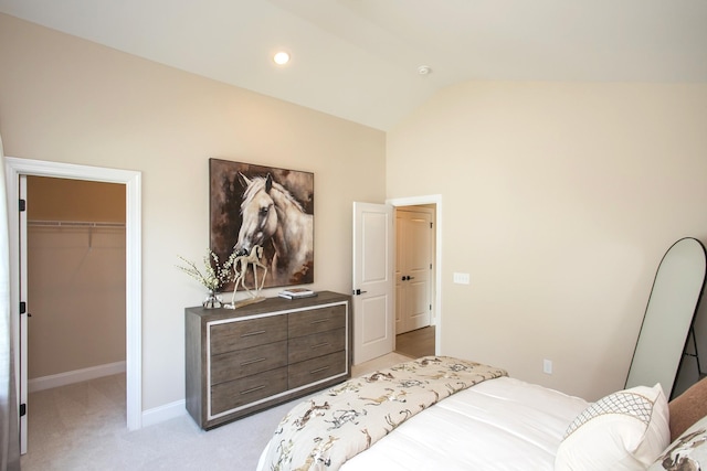 1935 Harmony Rd, Spring Hill, TN 37174 - bedroom with lofted ceiling, a walk in closet, light carpet, and a closet