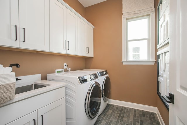 1935 Harmony Rd, Spring Hill, TN 37174 - laundry area with cabinet space and washing machine and dryer