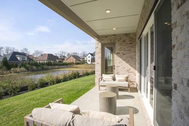 1935 Harmony Rd, Spring Hill, TN 37174 - view of patio with a residential view and a water view
