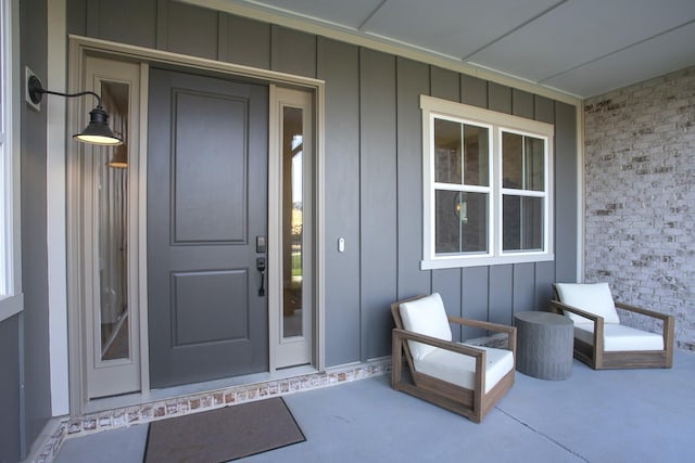 1935 Harmony Rd, Spring Hill, TN 37174 - property entrance featuring board and batten siding and brick siding