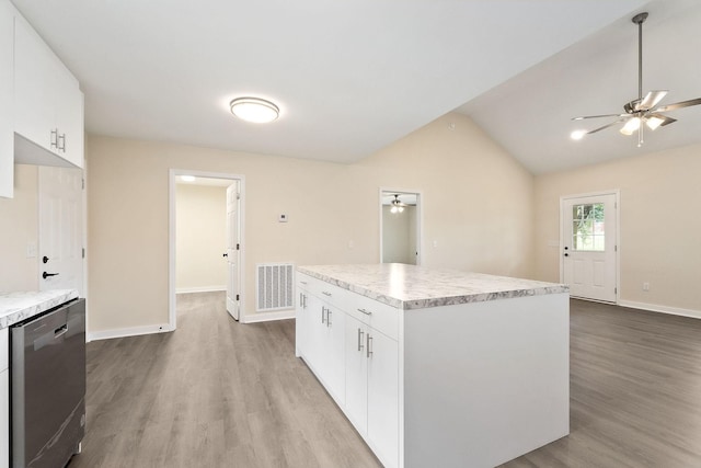 136 E School Dr, Rock Island, TN 38581 - kitchen with ceiling fan, dishwasher, light wood finished floors, a kitchen island, and vaulted ceiling