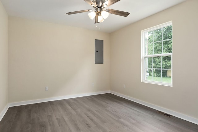 136 E School Dr, Rock Island, TN 38581 - empty room featuring electric panel, wood finished floors, and a ceiling fan