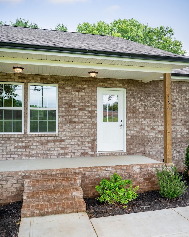 136 E School Dr, Rock Island, TN 38581 - entrance to property with brick siding and a shingled roof
