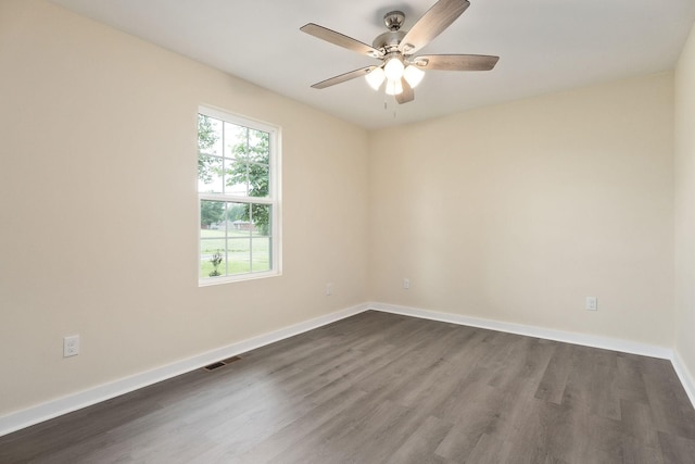 136 E School Dr, Rock Island, TN 38581 - spare room with dark wood finished floors and a ceiling fan