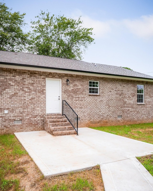 136 E School Dr, Rock Island, TN 38581 - back of house with crawl space, brick siding, a patio, and entry steps