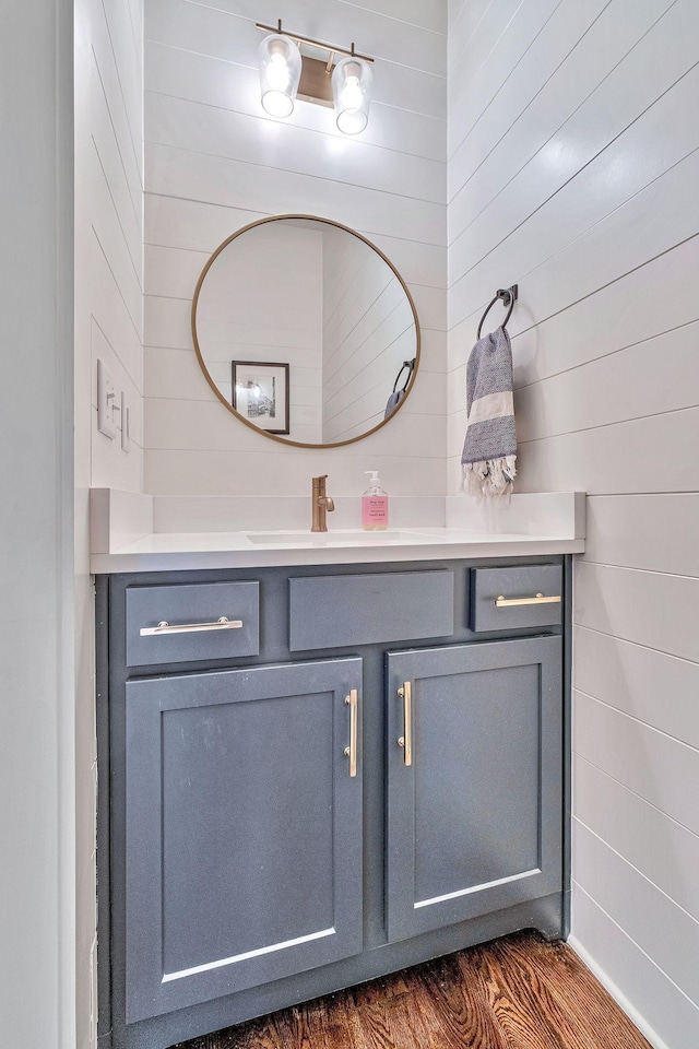 1510B 10th Ave N, Nashville, TN 37208 - bathroom with vanity, wood finished floors, and wooden walls