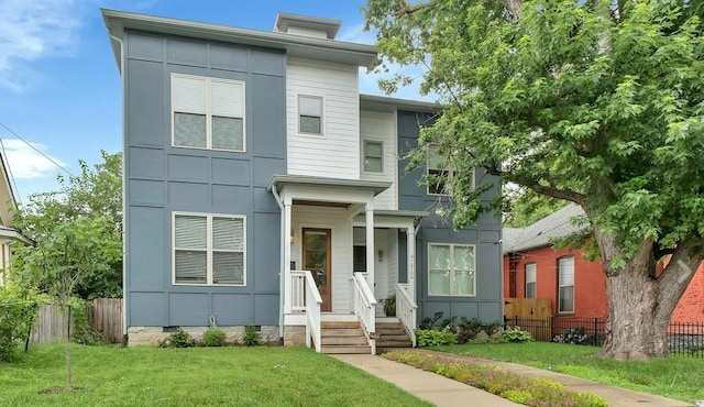 1510B 10th Ave N, Nashville, TN 37208 - view of front of house featuring crawl space, a chimney, and board and batten siding