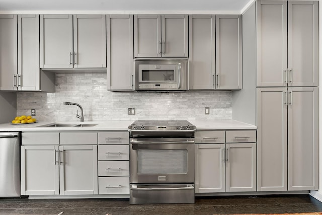 1212 Laurel St Unit 1510, Nashville, TN 37203 - kitchen featuring appliances with stainless steel finishes, gray cabinets, and light countertops