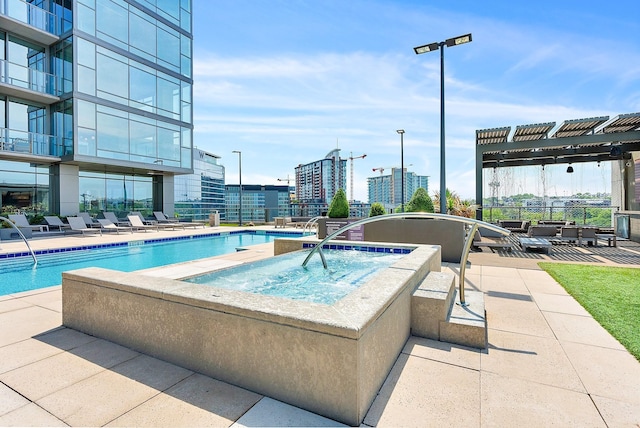 1212 Laurel St Unit 1510, Nashville, TN 37203 - view of pool with a community hot tub, a patio area, and a view of city