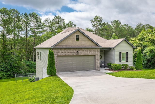 8624 Reba Ln, Hixson, TN 37343 - view of front of property with a garage, concrete driveway, and brick siding