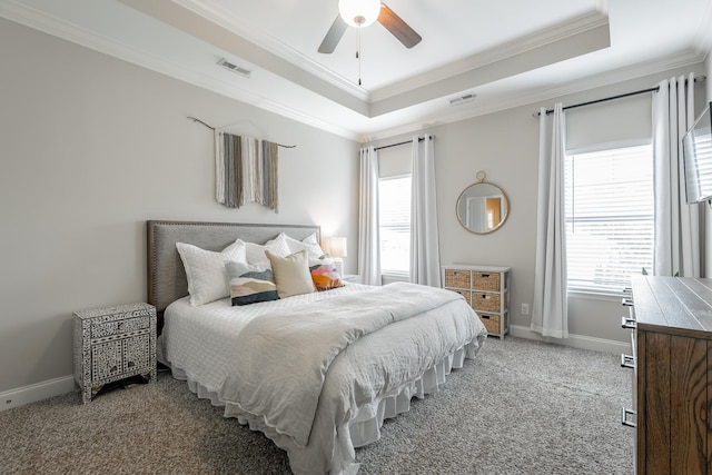 8624 Reba Ln, Hixson, TN 37343 - bedroom featuring light colored carpet, a tray ceiling, crown molding, and a ceiling fan