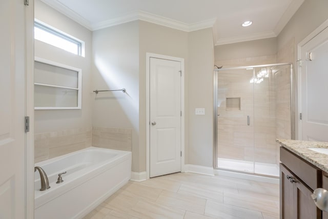 8624 Reba Ln, Hixson, TN 37343 - bathroom featuring a stall shower, a bath, vanity, crown molding, and recessed lighting