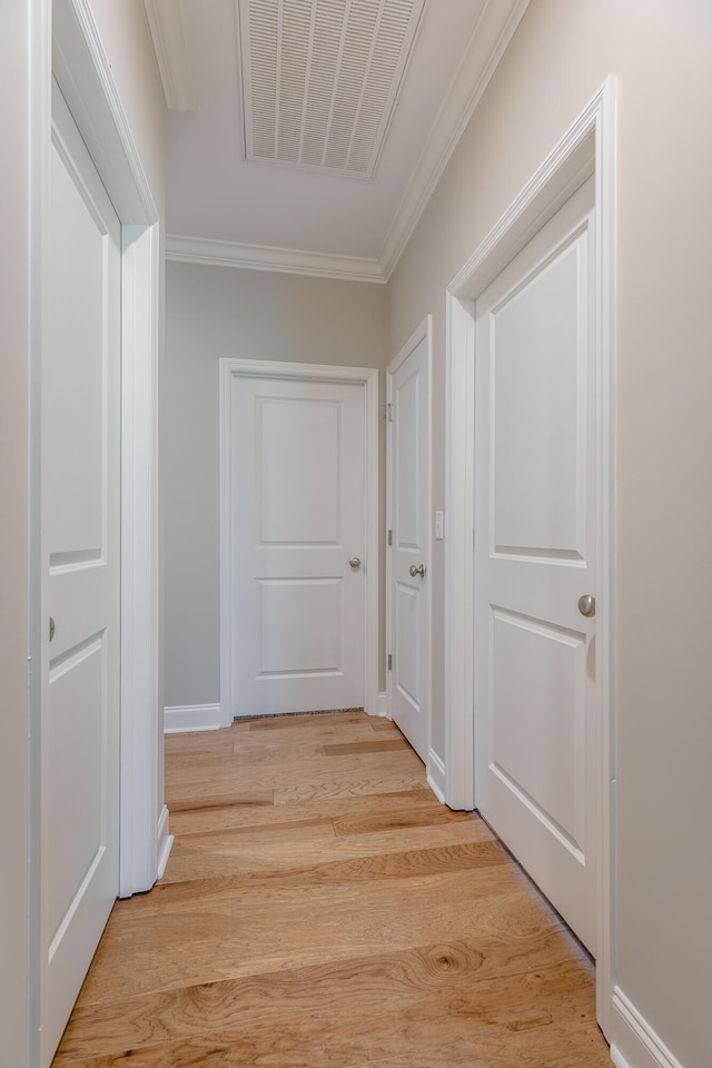 8624 Reba Ln, Hixson, TN 37343 - corridor with light wood-type flooring and crown molding
