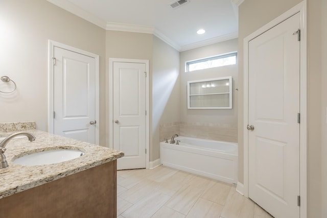 8624 Reba Ln, Hixson, TN 37343 - bathroom featuring a bath, vanity, and ornamental molding