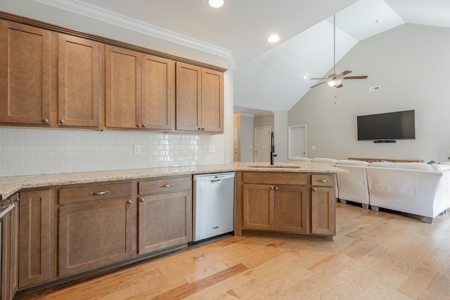 8624 Reba Ln, Hixson, TN 37343 - kitchen with dishwasher, lofted ceiling, a ceiling fan, a peninsula, and backsplash
