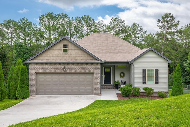 8624 Reba Ln, Hixson, TN 37343 - view of front of house with an attached garage, a front yard, concrete driveway, and brick siding