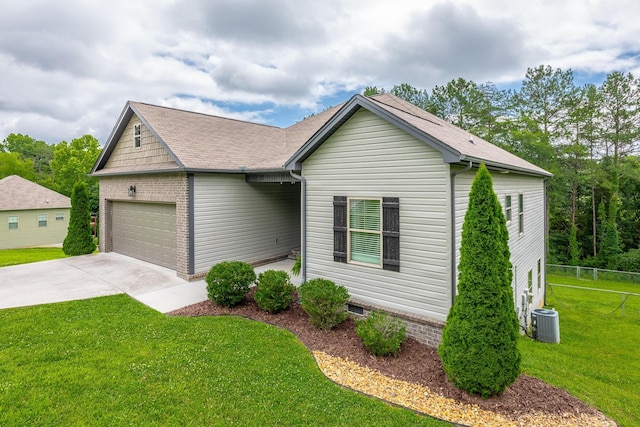 8624 Reba Ln, Hixson, TN 37343 - view of front facade featuring an attached garage, concrete driveway, roof with shingles, and brick siding