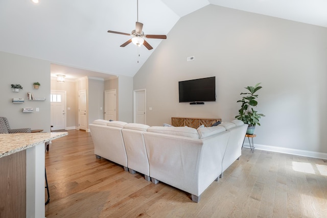8624 Reba Ln, Hixson, TN 37343 - living area featuring a ceiling fan, high vaulted ceiling, and light wood finished floors
