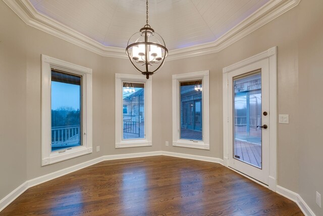 1825 Lake Meadow Trl, Mount Juliet, TN 37122 - unfurnished dining area featuring a chandelier, dark wood-type flooring, ornamental molding, and a tray ceiling