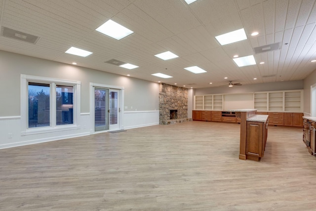 1825 Lake Meadow Trl, Mount Juliet, TN 37122 - unfurnished office with a fireplace, light wood-style floors, and ceiling fan