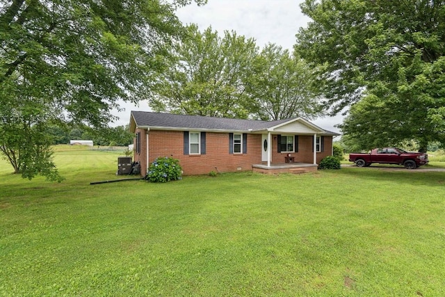 330 Union Camp Rd, Lafayette, TN 37083 - ranch-style house featuring covered porch, a front lawn, and brick siding