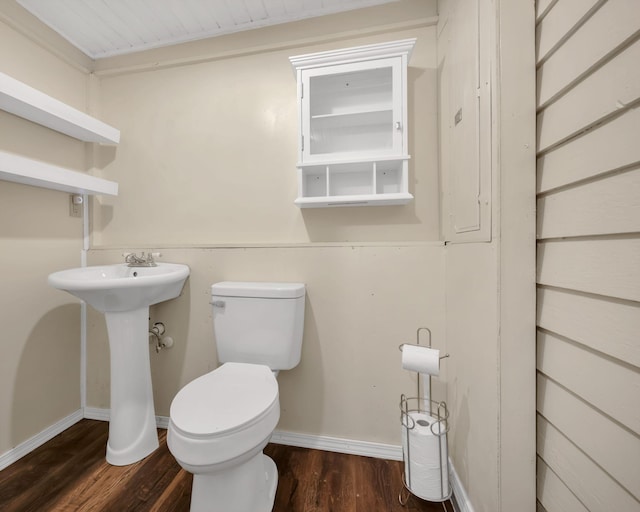 3328 Church St, Burns, TN 37029 - half bath featuring wood finished floors and toilet