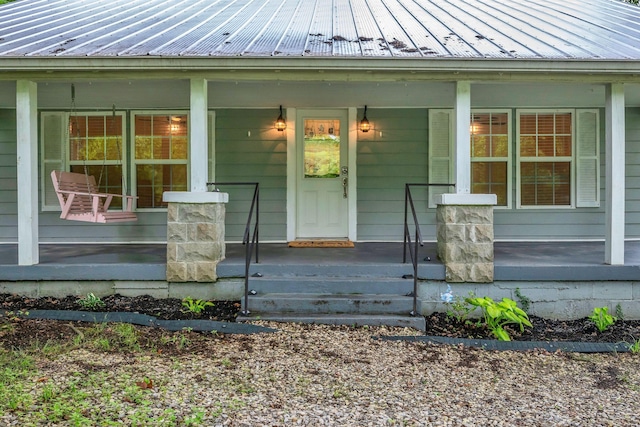 3328 Church St, Burns, TN 37029 - property entrance with a porch and a metal roof