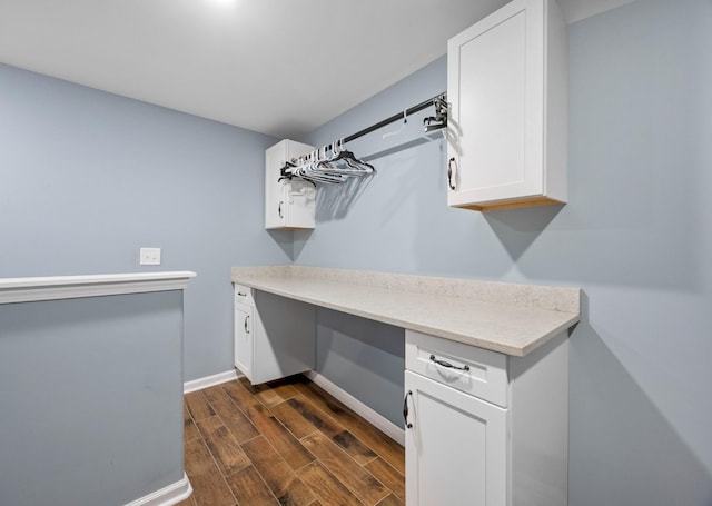 196 Deer Haven Rd, Indian Mound, TN 37079 - laundry area featuring dark wood-style flooring and a desk