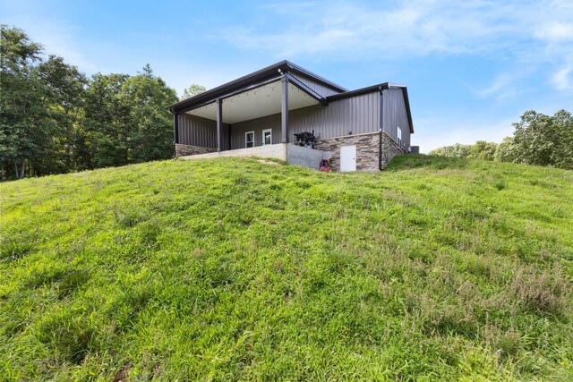 196 Deer Haven Rd, Indian Mound, TN 37079 - back of property featuring stone siding and board and batten siding
