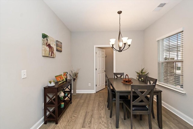 433 Longstone Rd, Gallatin, TN 37066 - dining area with a chandelier and wood finished floors