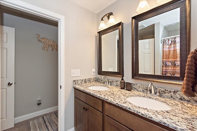 433 Longstone Rd, Gallatin, TN 37066 - bathroom featuring double vanity and wood finished floors