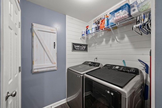 516 Cedarcrest Dr, Chapmansboro, TN 37035 - laundry area featuring washer and clothes dryer and wood walls