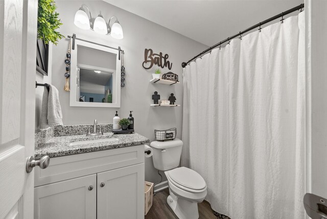 516 Cedarcrest Dr, Chapmansboro, TN 37035 - full bathroom featuring wood finished floors and vanity