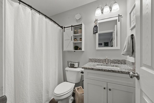 516 Cedarcrest Dr, Chapmansboro, TN 37035 - full bathroom featuring toilet and vanity