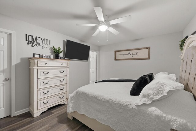 516 Cedarcrest Dr, Chapmansboro, TN 37035 - bedroom with dark wood-style floors and ceiling fan