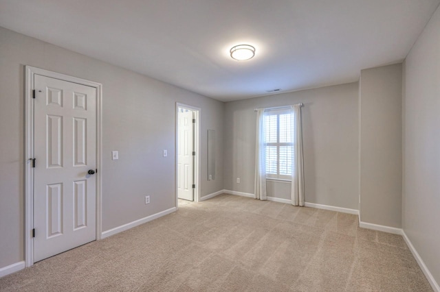 265 Stanley Park Ln, Franklin, TN 37069 - empty room with light carpet and baseboards