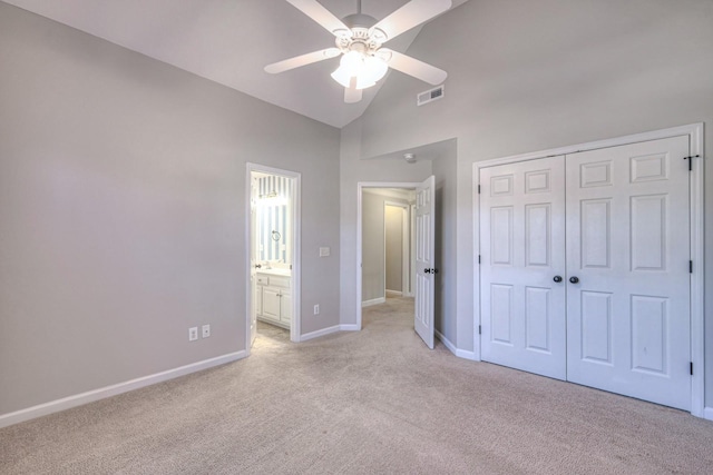 265 Stanley Park Ln, Franklin, TN 37069 - unfurnished bedroom with light carpet, high vaulted ceiling, a closet, a ceiling fan, and ensuite bathroom