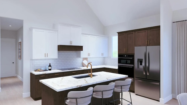 2092 Conductor Ln, Thompsons Station, TN 37179 - kitchen with black appliances, dark brown cabinetry, tasteful backsplash, and high vaulted ceiling