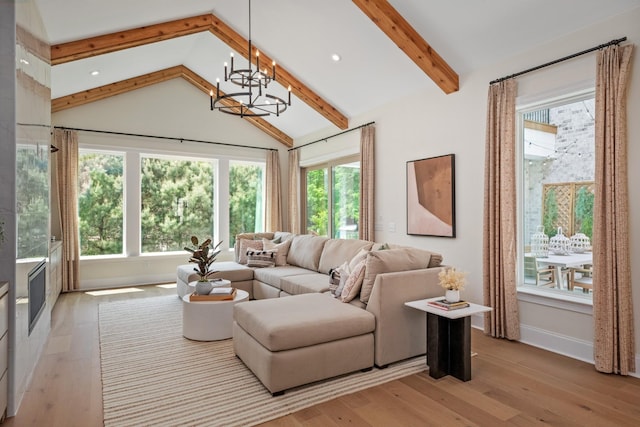3005 Littlebury Park Dr, Thompsons Station, TN 37179 - living room with a chandelier, healthy amount of natural light, beam ceiling, light wood finished floors, and high vaulted ceiling