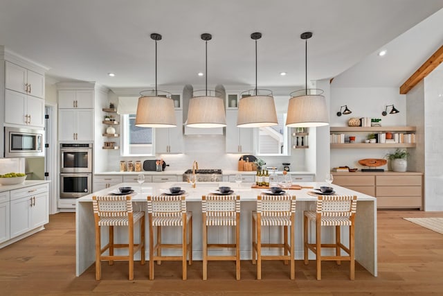 3005 Littlebury Park Dr, Thompsons Station, TN 37179 - kitchen with open shelves, appliances with stainless steel finishes, light countertops, and recessed lighting