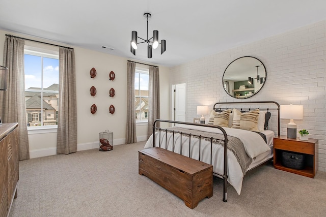 3005 Littlebury Park Dr, Thompsons Station, TN 37179 - bedroom with brick wall and carpet flooring