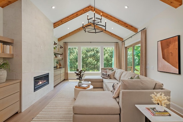 3005 Littlebury Park Dr, Thompsons Station, TN 37179 - living room with light wood-style floors, healthy amount of natural light, a chandelier, recessed lighting, and a tile fireplace