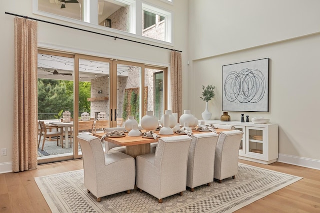 3005 Littlebury Park Dr, Thompsons Station, TN 37179 - dining room with healthy amount of natural light, light wood-style flooring, and a high ceiling