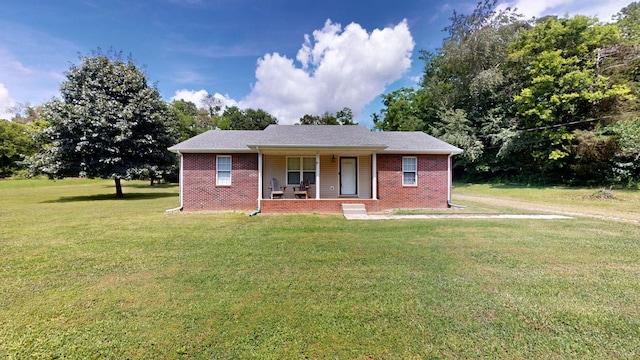 1726 Old Clarksville Pike, Chapmansboro, TN 37035 - view of front of property with a porch, a front lawn, and brick siding